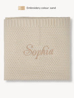 Gestrickte Decke Creme